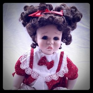 Adorable vintage porcelain doll.